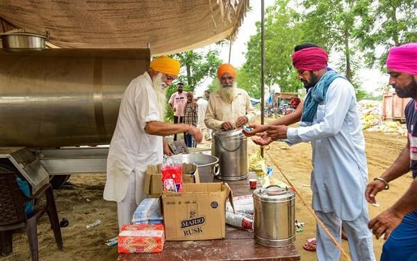 Authorities use pumps to drain out water from flood-hit areas, distribute relief material in Punjab, Haryana