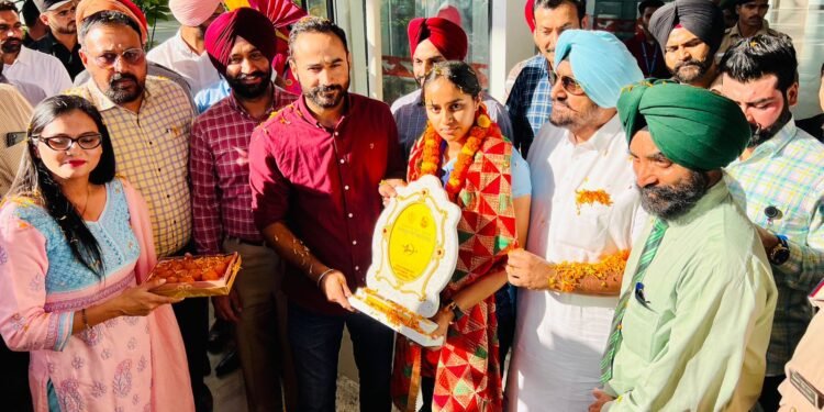 PUNJAB MINISTER MEET HAYER GIVES WARM WELCOME TO ASIAN GAMES MEDALIST IN ARCHERY PARNEET KAUR AT MOHALI AIRPORT