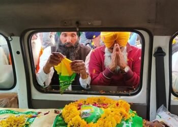 Farmer leaders gather to pay their respects to Shubhkaran Singh as his body is transported to the Khanauri border.