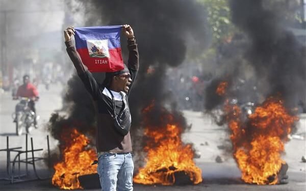 Foreign nationals stranded in conflict-ridden Haiti anxiously await an opportunity to escape the turmoil.