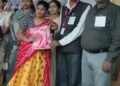 वस्त्र ,मिठाई ,बिस्किट और पठन सामग्री भेट
